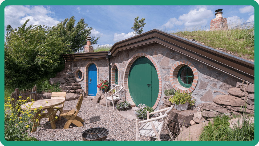 glamping hobbit hole with green door