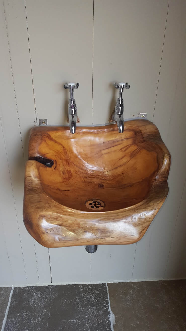 Hand carved wooden sink