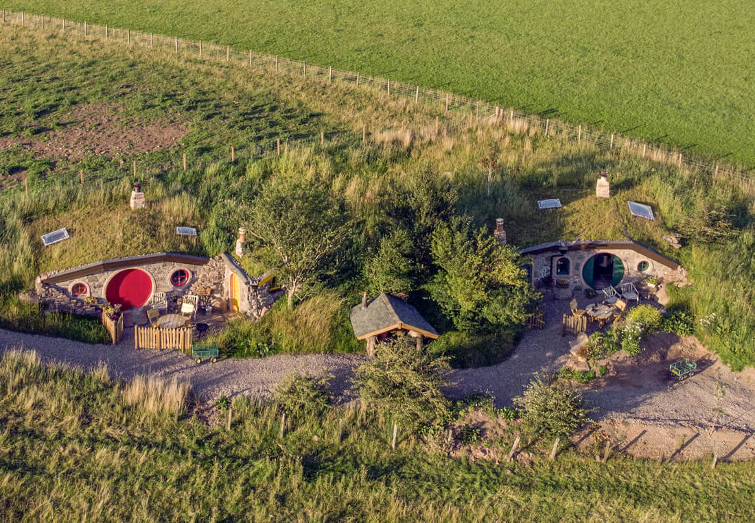 Two hobbit hole unique cottages aerial view