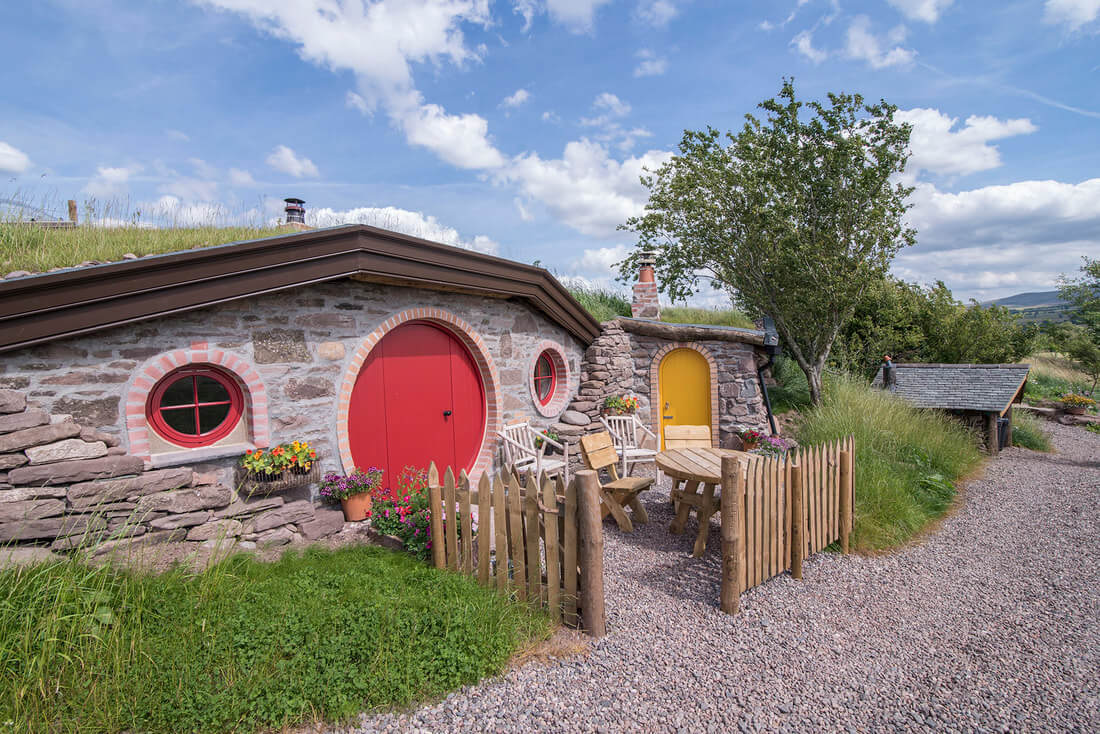 Glamping Hobbit hole with red door